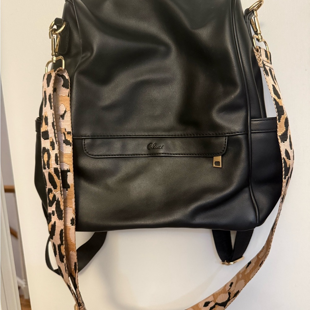 Chic Black Faux Leather Backpack with Leopard Strap